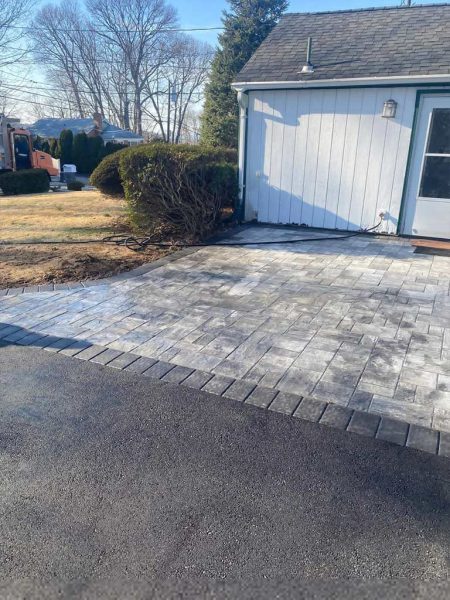 Our asphalt pavers working in Riverhead